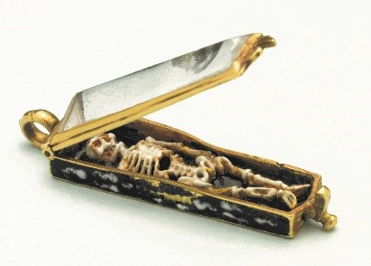 Memento mori pendant reminding believers to think of their spiritual, rather than worldly wealth